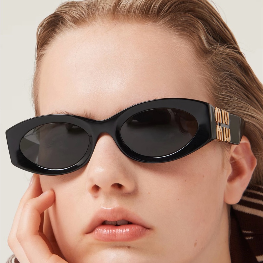 Miu Miu Black Sunglasses with Gold Detail
